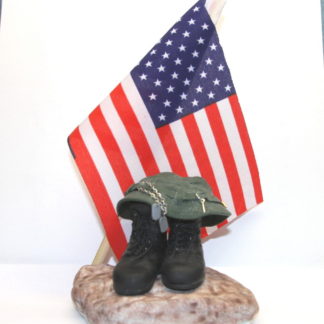 military sculpture with american flag
