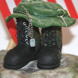 green boots and boonie hat close up