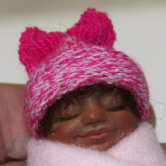 pink mexican african baby girl doll face