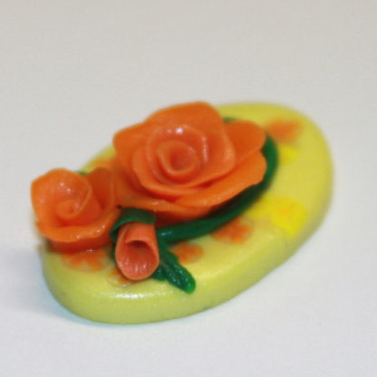 Yellow Cabochon with orange roses and flowers