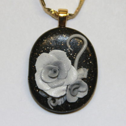 Grey Roses on Black Cabochon with Gold Bail