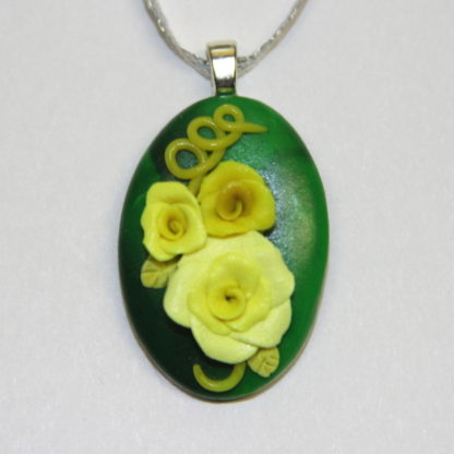 3 dimensional yellow roses on Green Polymer clay cabochon Silver Bail