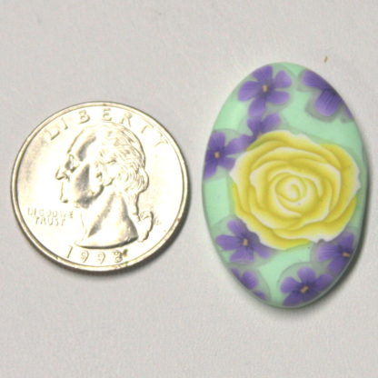 Yellow Rose Lavender Flowers Mint Green Pendant Next to Ruler