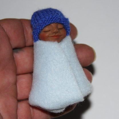 Baby Boy Ethnic Doll in Hand
