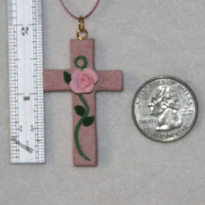 Pink cross with size compare